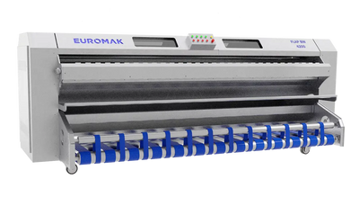 Industrial carpet dust remover machine with a metal body and blue brushes, labeled 'EUROMAK'.  industrial carpet dusting machine shaking loose debris